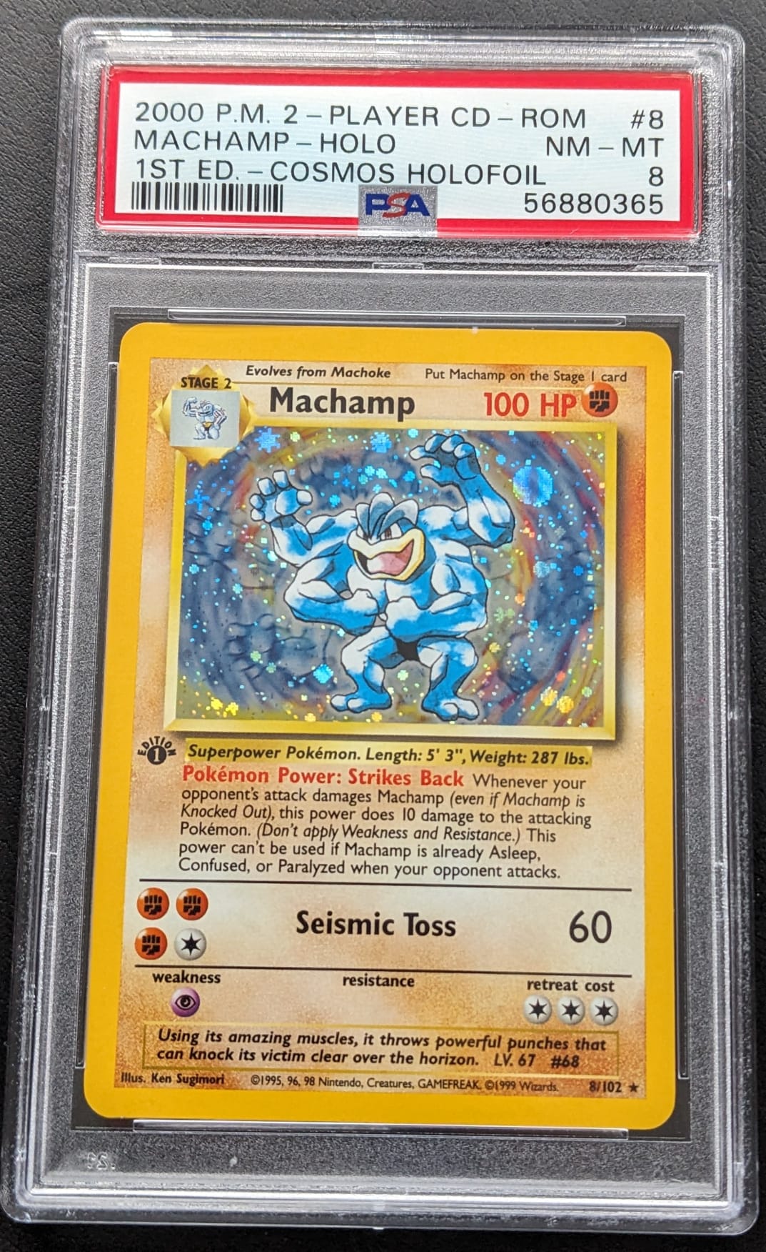 PSA 8 + 1. Edition Cosmos Holo Machomei 8/102 Pokemon Karte Basis Set Machamp