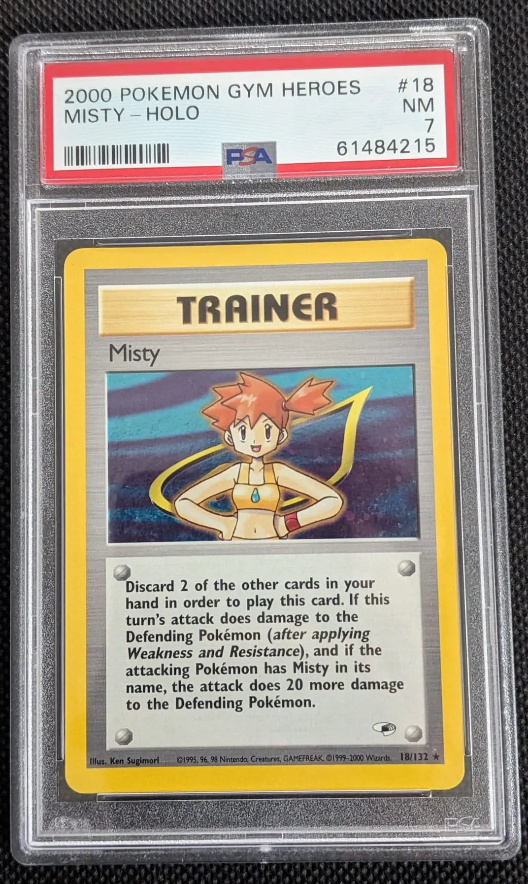 PSA 7 + 🌀 Holo Swirl Misty 18/132 Gym Heroes Pokemon Karte English - Image #1