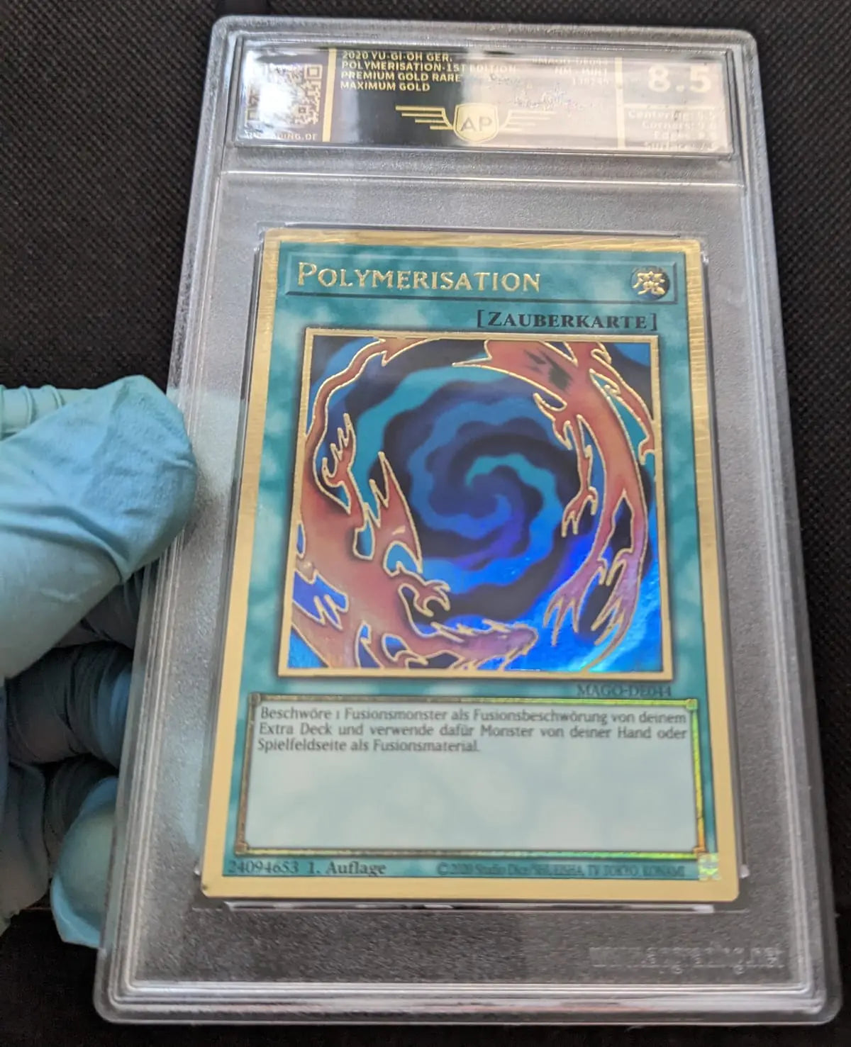 AP Grading 8,5 Polymerisation Polimerization Gold Rare MAGO-DE044 Yu-Gi-Oh Deutsch - Image #1